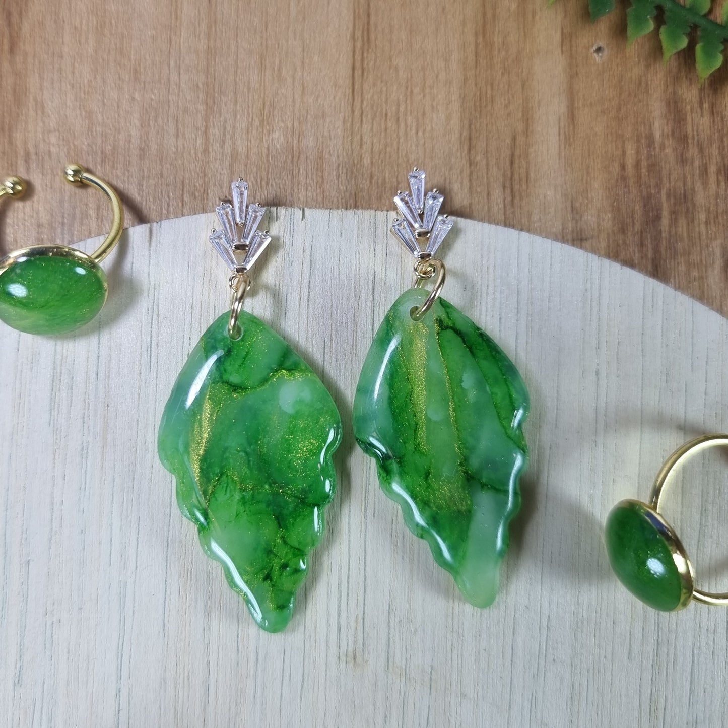 Leaf green and gold long Leaf dangles with Zircon