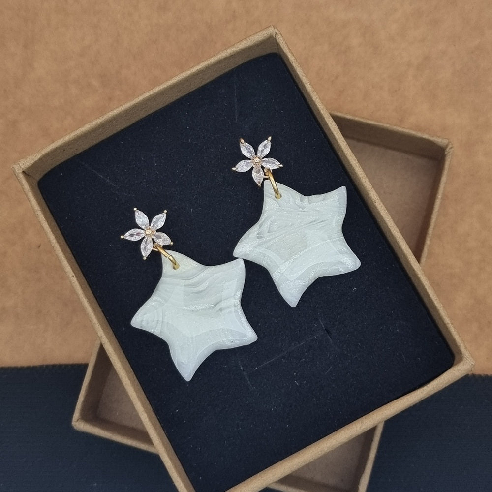 Pearl white and light grey Star dangles with Zircon