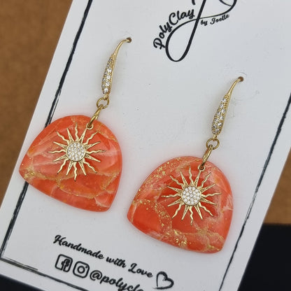 Fiery orange marble arch dangles with zircon sun pendant (Gold)