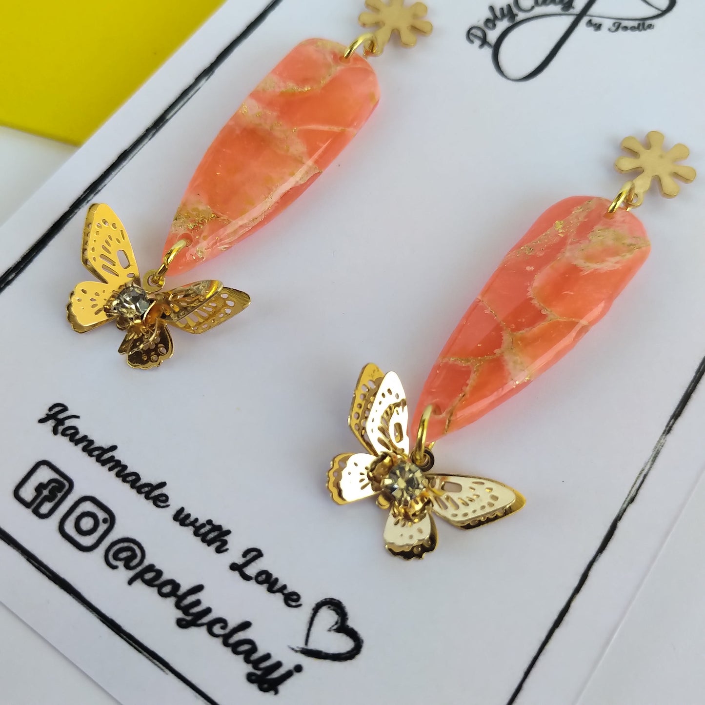 Fiery orange marble small dagger dangles with butterfly pendant (Gold)